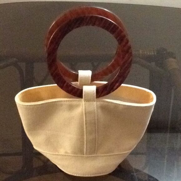 Urban outfitter round handled small bag. Tan yellow. Clean. Vacation! - Picture 1 of 9